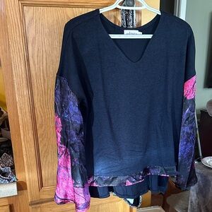 Elegant Women's Top with Vibrant Sleeves